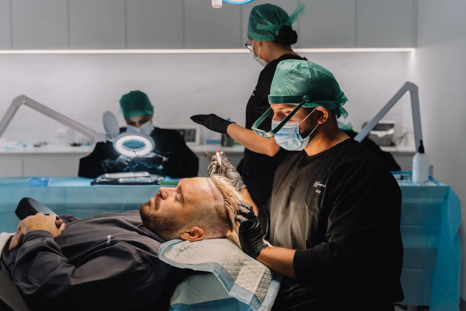 Hair Doctors surgical team placing grafts during a hair transplant